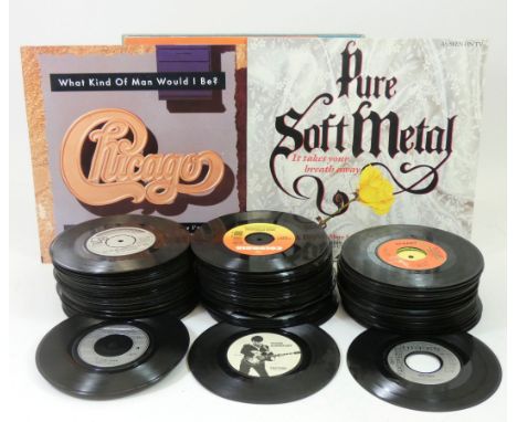 A collection of LPs, singles and compilations, including  artists such as Elvis, Bon Jovi, The Beatles, The Rolling Stones an