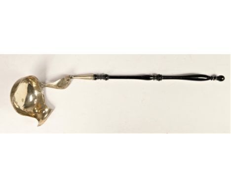 A 19th century German silver ladle, Hamburg, c.1850, makers mark overstruck, town mark, the bowl with large pourer to a turne