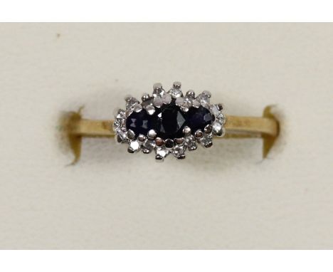 A 9ct gold sapphire and diamond cluster ring, O, 1.8gm 