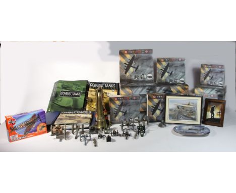 A reproduction Royal Artillery bugle, together with diecast models of military cannons, boxed Atlas models of fighter planes 