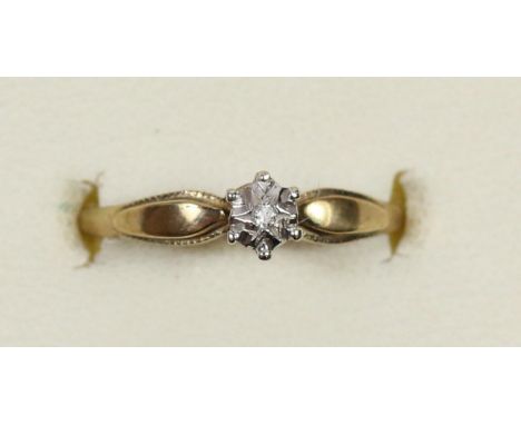 A 9ct gold and single stone diamond ring, N, 1.1gm 