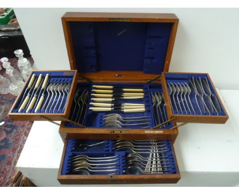 An Edwardian matched part canteen set for twelve, in fitted oak canteen by Harrison Brothers & Howson, also bearing label for