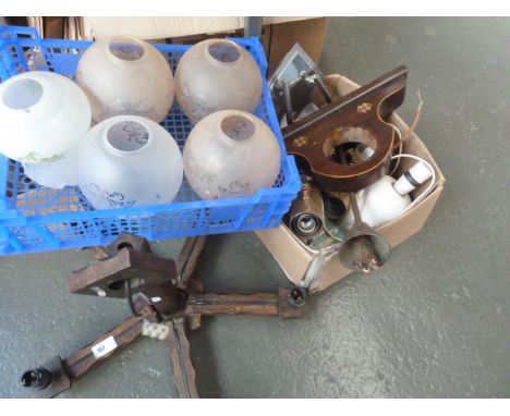 A box of light fittings and acid etched shades