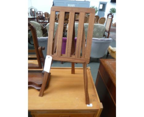 A teak table top artist's easel collapsible and fully adjustable 65cmH