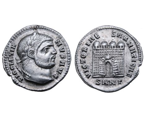 Diocletian AR Argenteus. Nicomedia, AD 295-296. DIOCLETIANVS AVG, laureate head right / VICTORIAE SARMATICAE, camp gate with 