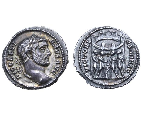 Diocletian AR Argenteus. Ticinum, AD 294. DIOCLETIANVS AVG, laureate head right / VICTORIA SARMAT, four tetrarchs sacrificing