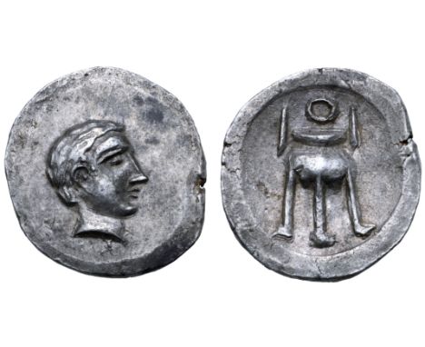 Crete, Axos AR Stater. Circa 4th century BC. Young beardless head of Apollo right with short cropped hair / Tripod with handl