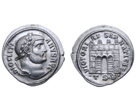 Diocletian AR Argenteus. Thessalonica, AD 302. DIOCLETIANVS AVG, laureate bust right / VICTORIAE SARMATICAE, four-turreted ca