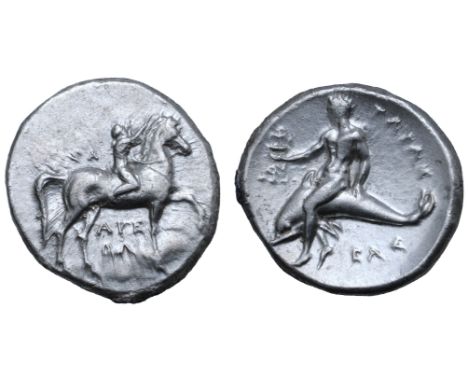 Calabria, Tarentum AR Nomos. Arethon, Sa-, and Cas-, magistrates. Circa 281-270 BC. Nude youth on horseback right, crowning h