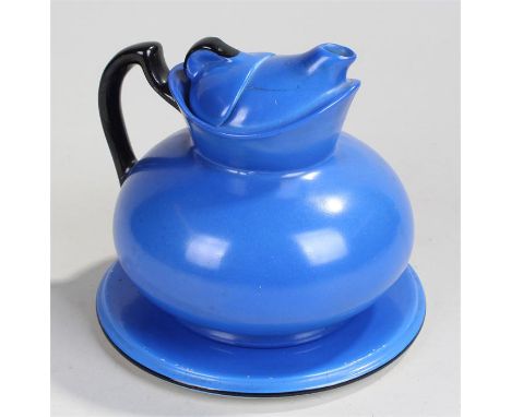 Burslem "cosy" teapot on stand, glazed in blue