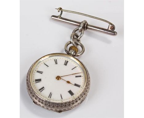 Silver open face pocket watch, the white enamel dial with Roman hours, brooch pair attached 