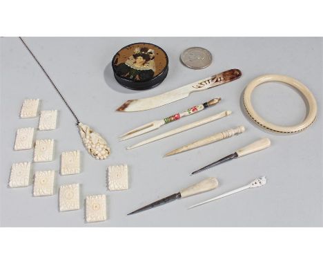 Mixed works of art, to include a papier mache snuff box, bone objects, a horn knife, a bangle, (qty)