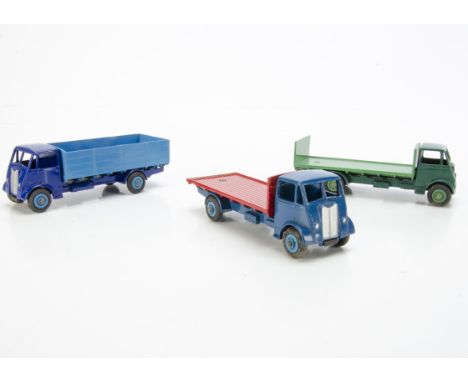 Dinky Toy Guy Trucks, 512 Guy Flat Truck, 1st type dark blue cab and chassis, red flatbed, mid-blue grooved hubs, 513 Guy Fla