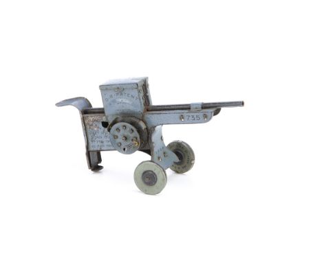 A Lehmann Tinplate 'EM GE' Machine Gun No.735, finished in pale blue with opening ammunition hopper, firing mechanism and whe