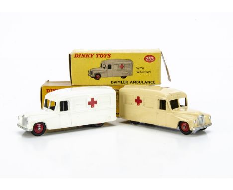 Dinky Toys 253 Daimler Ambulances, two examples, first cream body, red ridged hubs, no glazing, second example white body, re