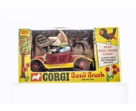 A Corgi Toys 808 Basil Brush's Car, red/yellow car, Basil figure, soundbox and laugh tape, in original box, E, box G-VG, cell