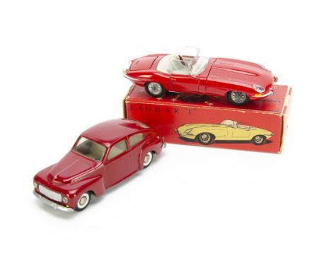 A Tekno 926 Jaguar E Type, red body, light grey interior, detailed cast hubs, in original box, with loose 822 Volvo PV544, da