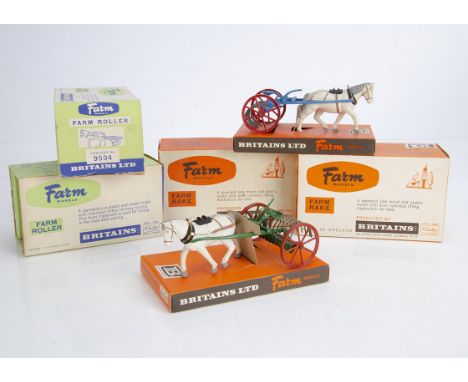 Britains final version boxed horse drawn farm vehicles comprising 9504 Farm Roller and 9506 Farm Rake, 2 of each, diecast wit
