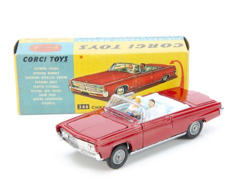 A Corgi Toys 246 Chrysler Imperial, red body, pale blue interior, driver and passenger, golf trolley in boot, detailed cast h
