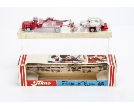 A Tekno 436-437 Volvo Tow Truck, Trailer &amp; Car, set comprises red Volvo 'Falck Zonen' tow truck, trailer and 832 MG 1100,