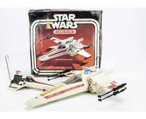 Vintage Kenner Star Wars X-Wing Fighter, in original box with instructions, with loose Mattel Battlestar Galactica Colonial V