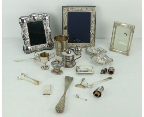 Two silver Photograph Frames, a pair of small pierced silver Bon Bon Dishes; silver Cigarette Lighter, and other silver spoon