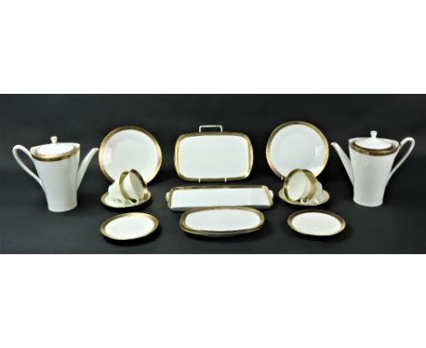 A fine quality cream ground German porcelain Dinner and Tea Service, with attractive silk and gilt decorated borders comprisi