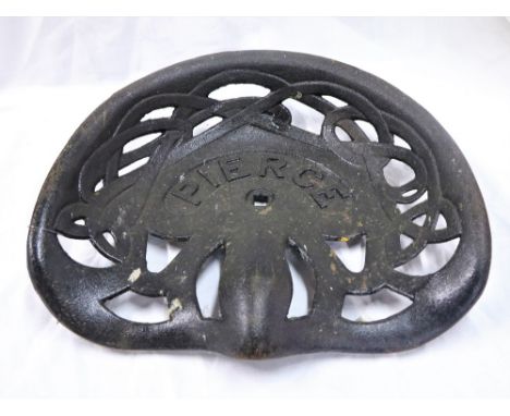 An early "Pierce" cast iron and pierced Tractor Seat. (1)