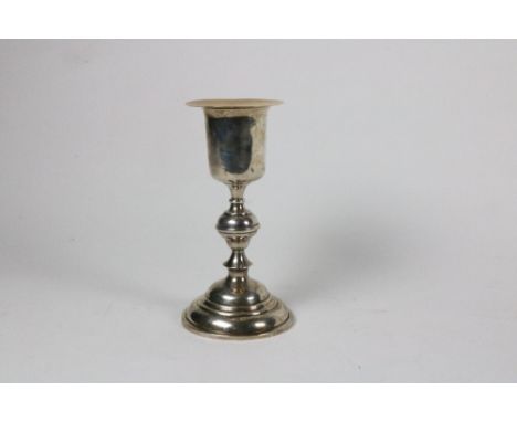 A Victorian Irish silver Chalice, c. 21.5cms (8 1/2") high, and a gilt paten, 8 ozs. (1)