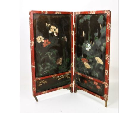 A two fold Chinese painted Firescreen, with lacquered design, together with three Middle Eastern hand cut Theatre Props. (4)