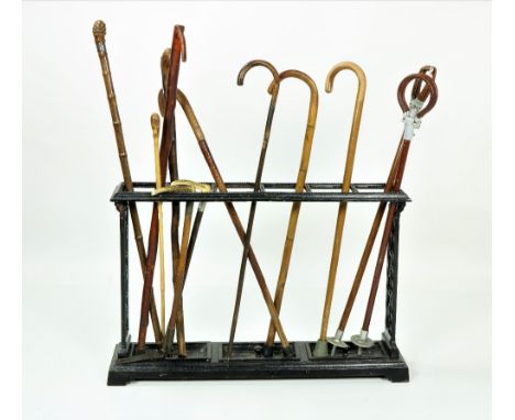 A Victorian Coalbrookdale metal Stick &amp; Umbrella Stand, together with a collection of Bentwood Walking Sticks and others.