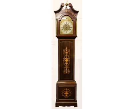 An impressive large Edwardian inlaid mahogany Longcase Clock, the swan neck pediment over an inlaid frieze above a domed bras