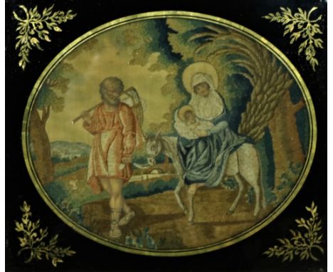 A fine quality 19th Century Needlework silk and woolen Tapestry, depicting "Joseph, Mary and the Infant Jesus on a Donkey, in