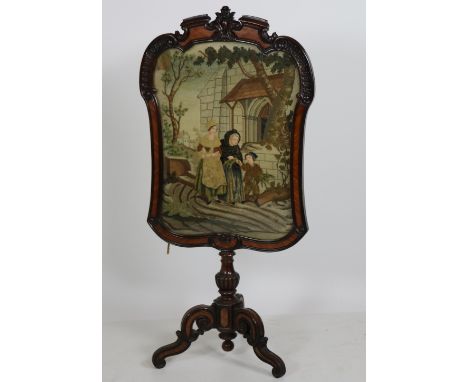 A 19th Century French mahogany and kingwood banded Cheval Firescreen, of cartouche shape, with a tapestry Panel depicting fig
