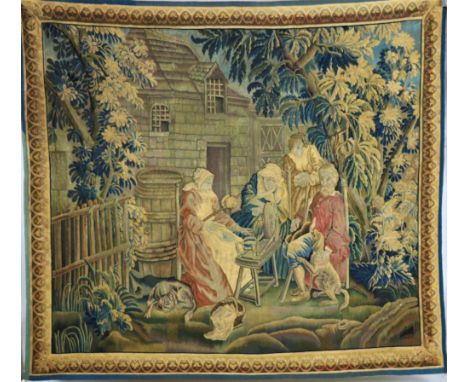 A fine 18th Century French polychrome Tapestry, "Manufacture Nationale des Gobelins" depicting four figures around a spinning