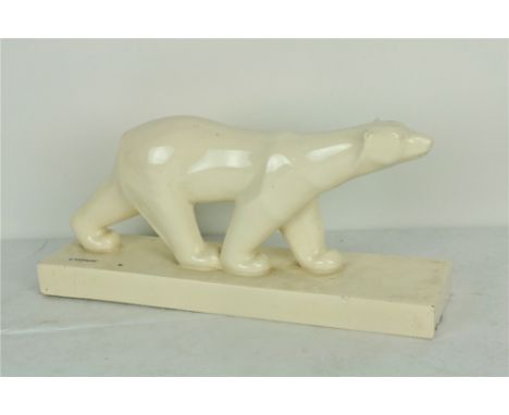 A scarce cream ceramic Model of a Polar Bear, signed Lauroff. (1)