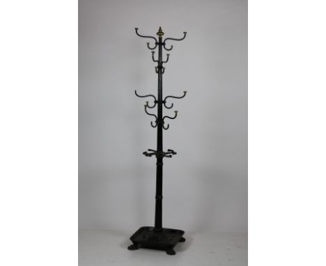 A Victorian brass mounted cast iron Hat, Stick &amp; Coat Stand, probably Coalbrookdale, the half turned, half fluted stem wi