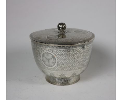 A large and attractive Chinese silver Bowl &amp; Cover, apparently unmarked, the lid with peony finial, decorated all over in