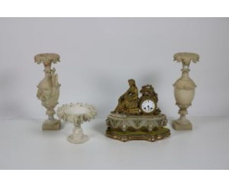 A Victorian ormolu mounted figural Mantle Clock, on alabaster body, and on gilt wooden stand, a pair of tall alabaster Vases 