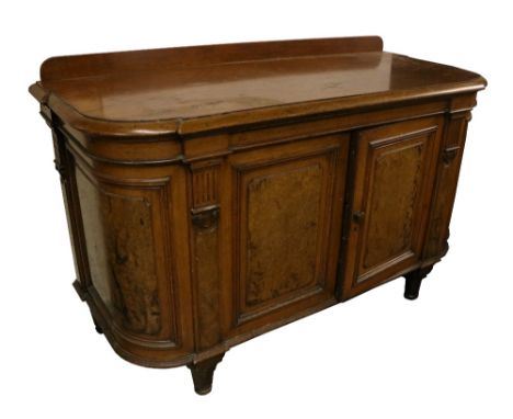 A Victorian walnut Buffet, with moulded shape top over two panel doors with dome ends, 89cms (35") high x 143cms (56") wide x