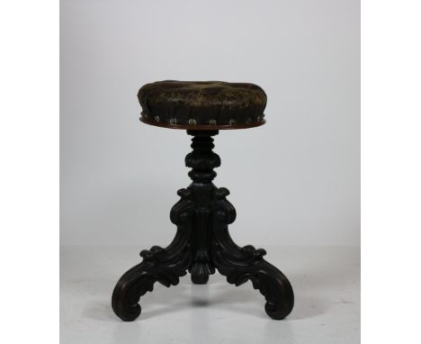 A Victorian telescopic mahogany Piano Stool, with leather seat on ornate carved tripod base. (1)