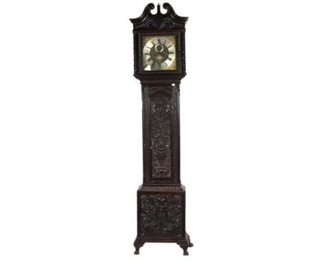 A 19th Century carved oak Grandfather Clock, the swan neck pediment over a glazed panel door housing a decorated brass and si