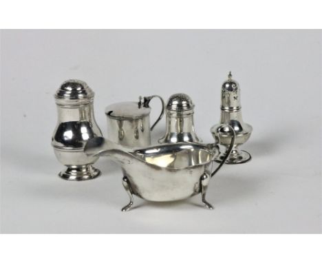 Silverware: A collection including a Sheffield Sauceboat, a Chester silver Mustard Pot and lid with glass liner, and three va