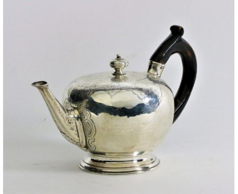A fine quality 18th Century silver bullet Teapot, with engraved body decorated with shell motifs, wooden handle and facet and