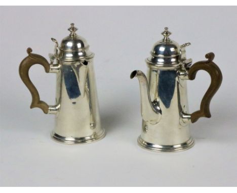 Two attractive Georgian style silver Coffee and Hot Water Pots, with side funnels, 'S' scroll handles and shaped finial hinge