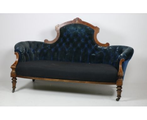 A Victorian inlaid walnut Settee, with arched and button back and padded seat on turned front legs, 69" (175cms). (1)