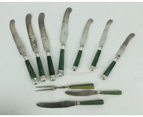 A set of 10 green porcelain handled Dinner Knives, each with silver plated shell finial and curved steel blade together with 