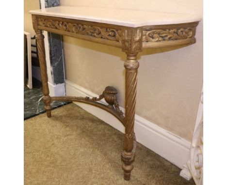 A pair of attractive French style giltwood marble top Console Tables, with shaped moulded marble tops, over decorated friezes