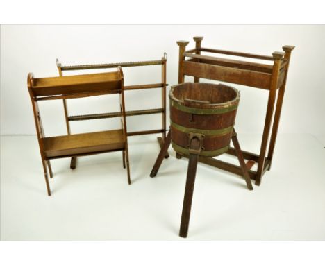 A brass mounted Edwardian oak Plant Holder, on three out splayed legs, an attractive Arts &amp; Crafts style pierced oak Book