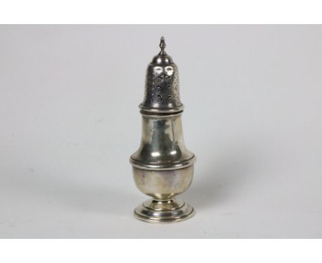 An English Georgian silver Cream Jug, a large Birmingham silver Castor Sugar Shaker, and a pair of small modern Sheffield sil